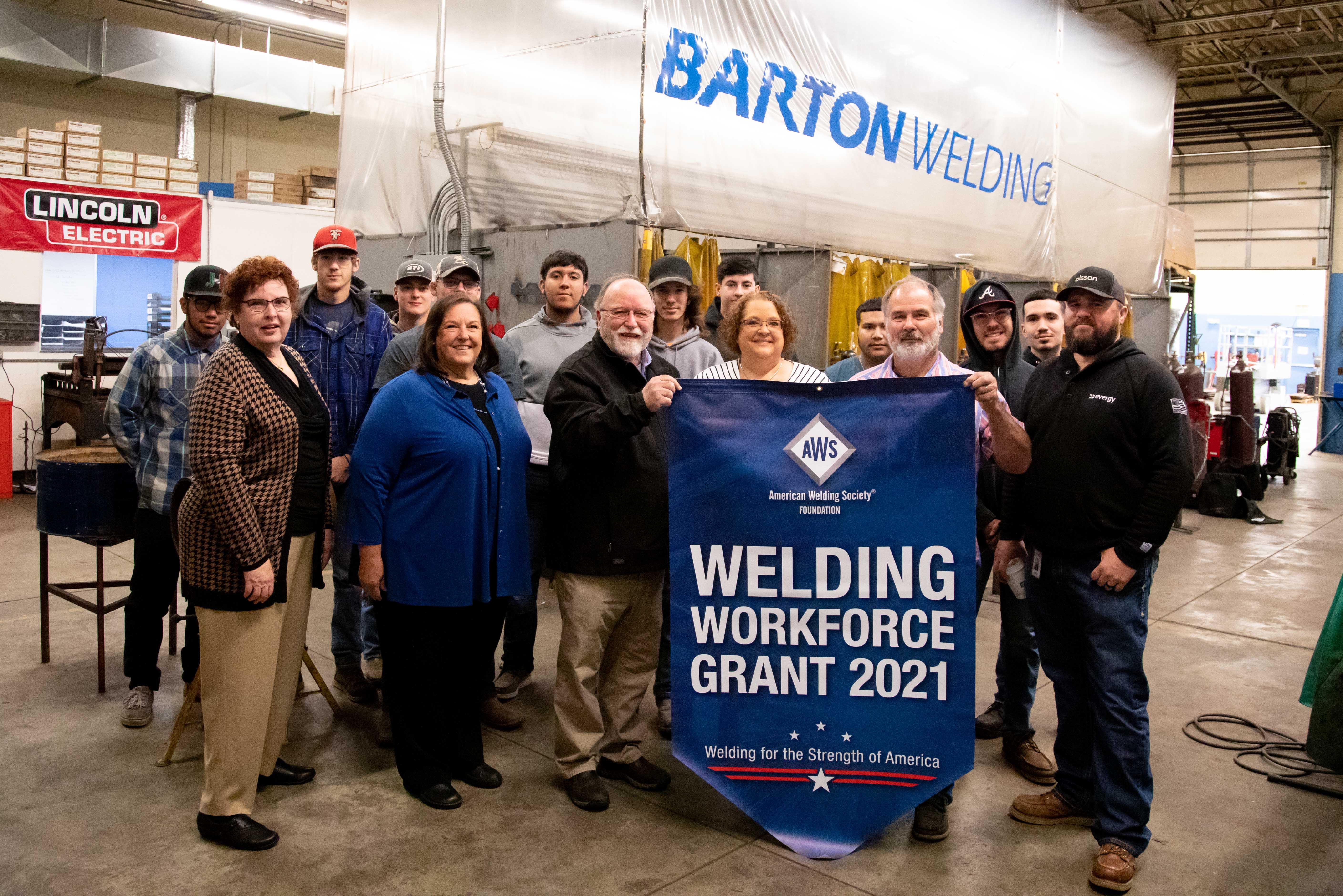 Representatives from Barton Community College and the American Welding Society (AWS) gathered Thursday morning