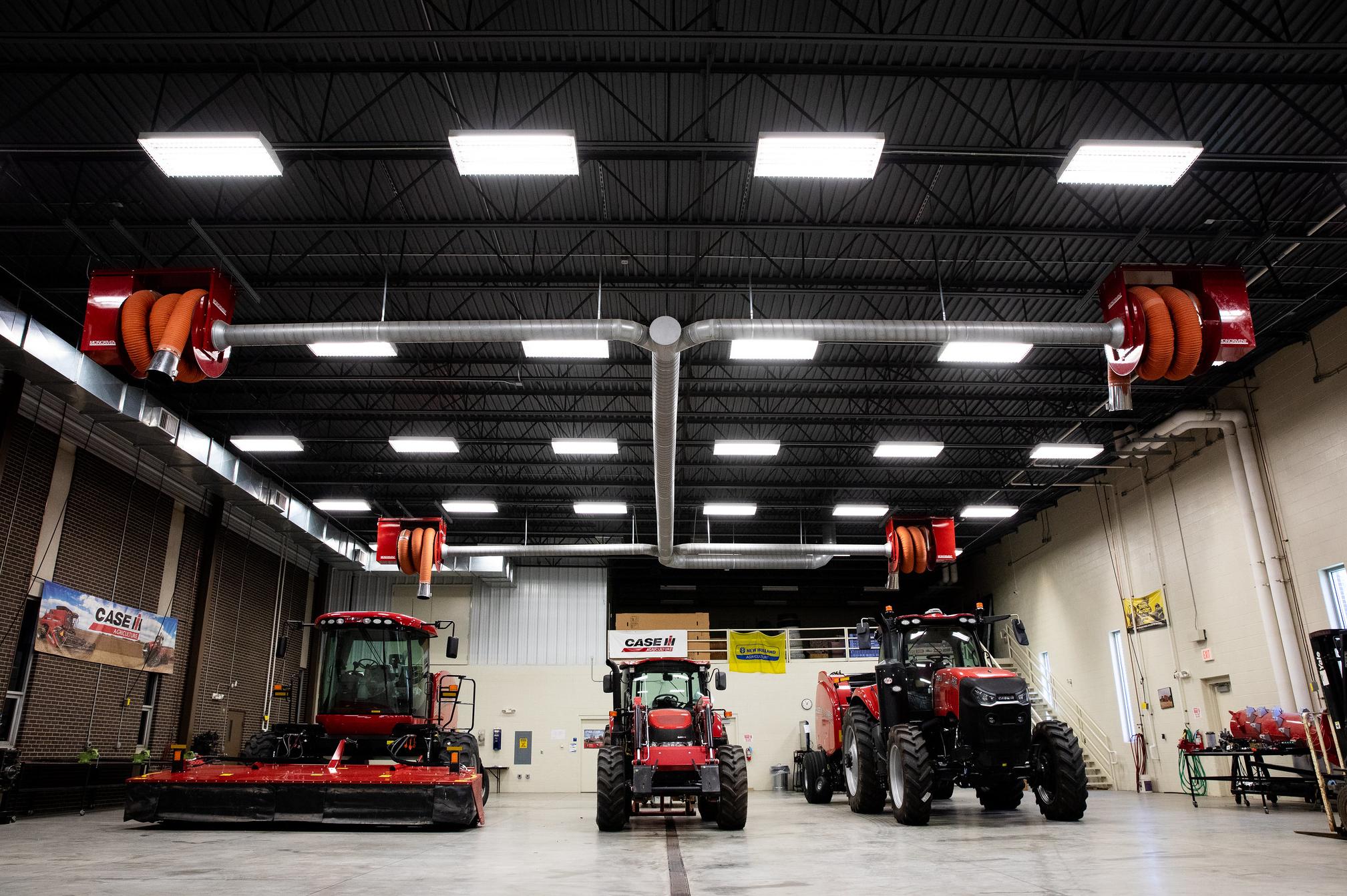 tractors in a big building