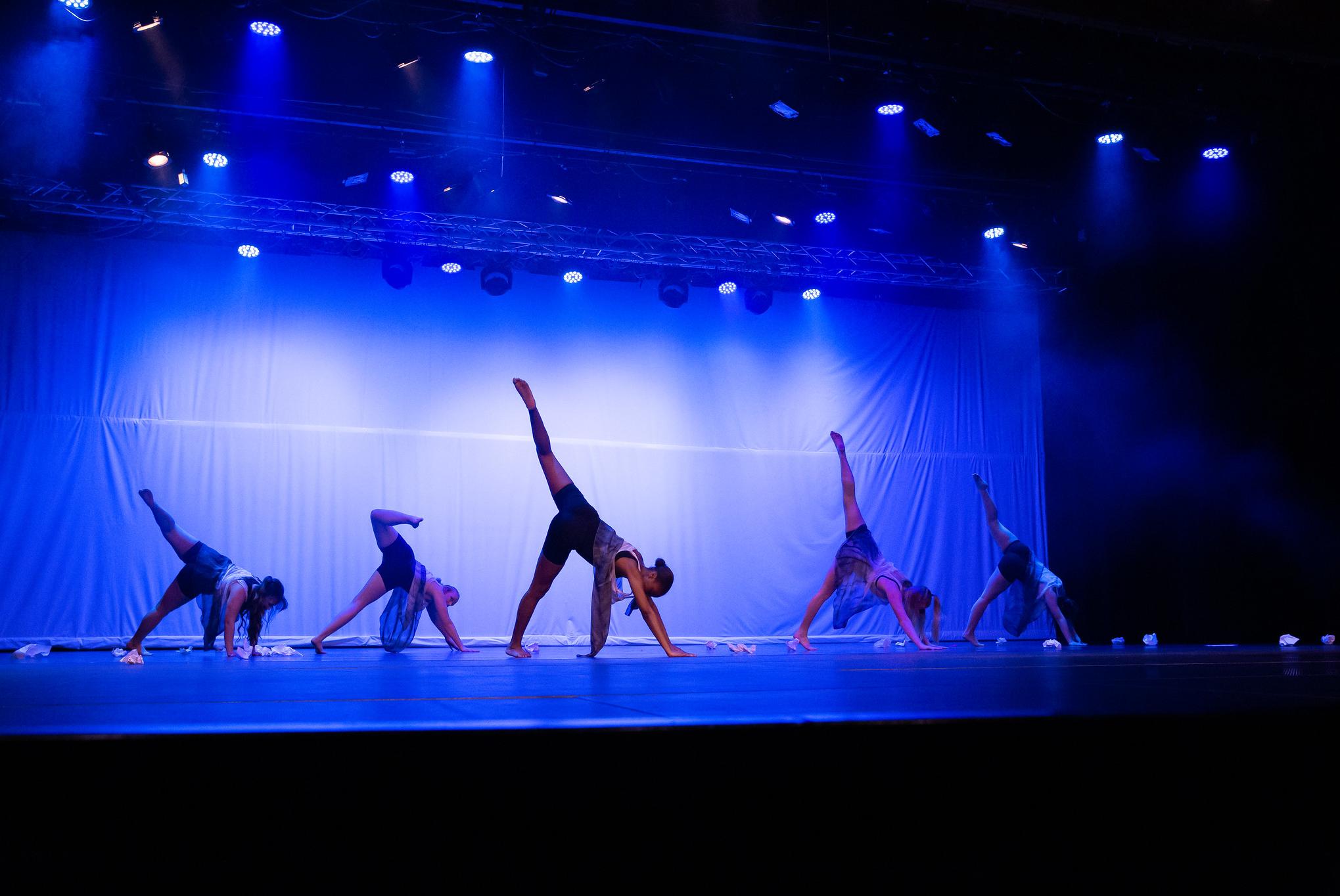 dancers dancing on a stage