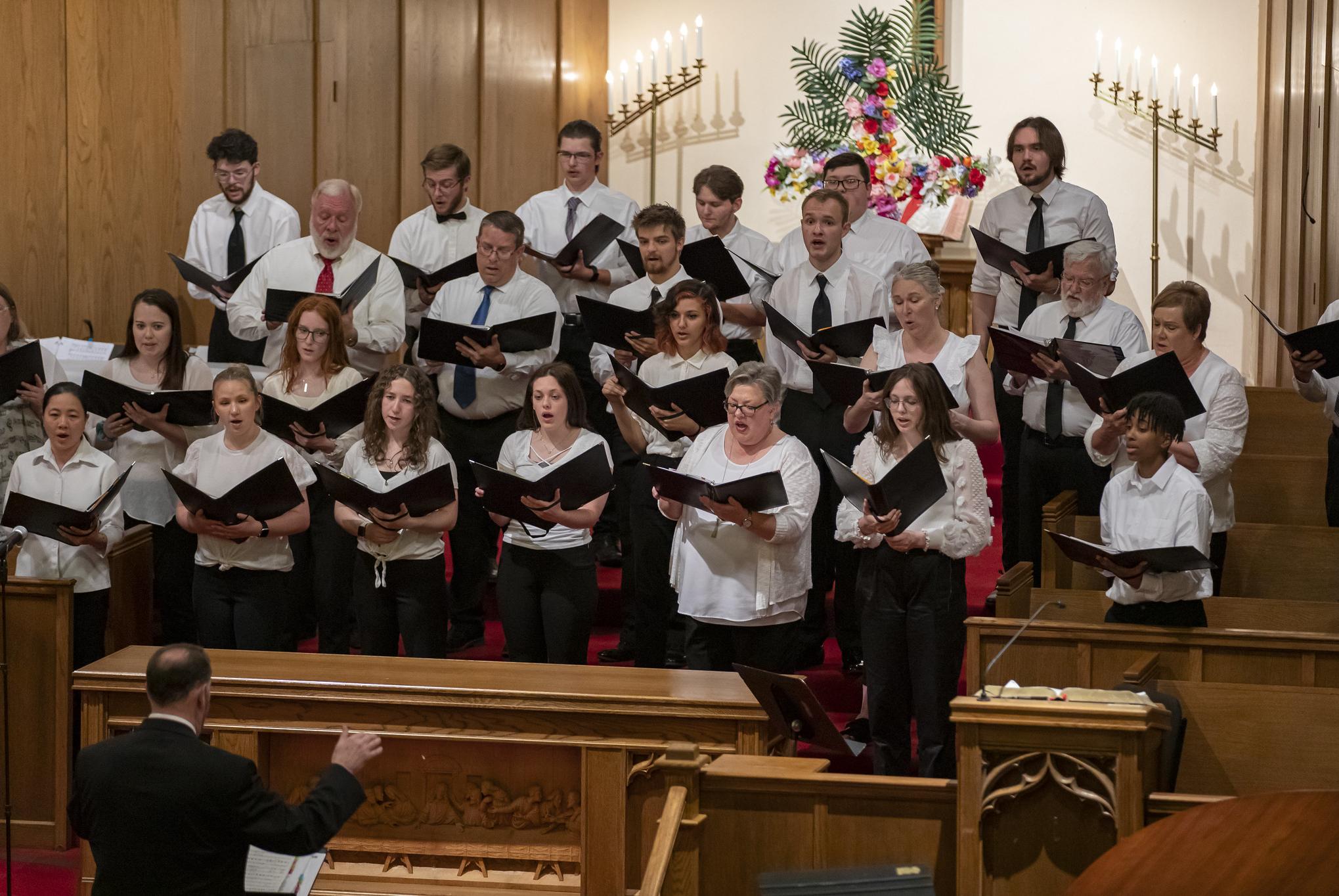 people singing in a choir