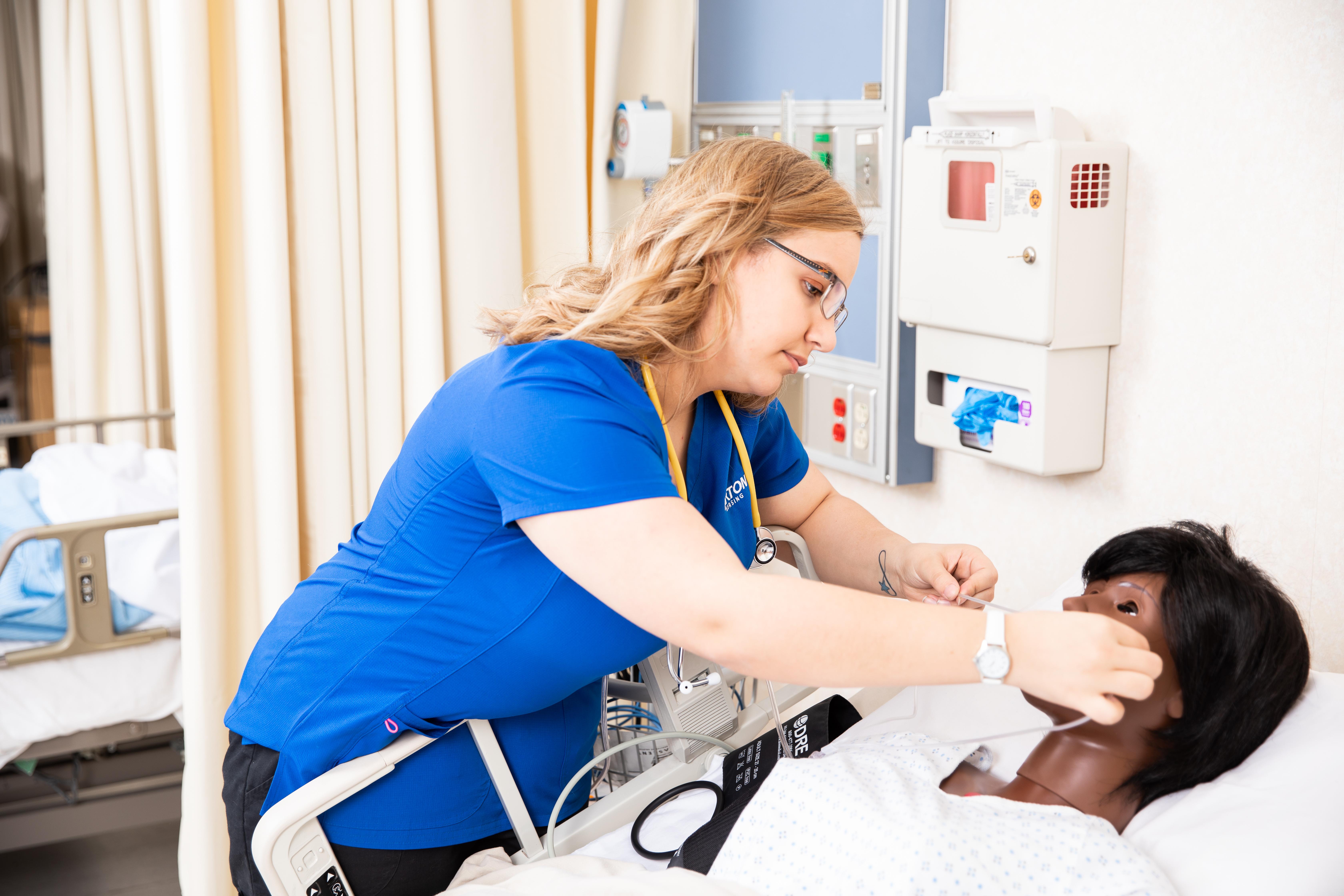 A Barton Nursing student practices a procedure at the Pratt Community College Campus.