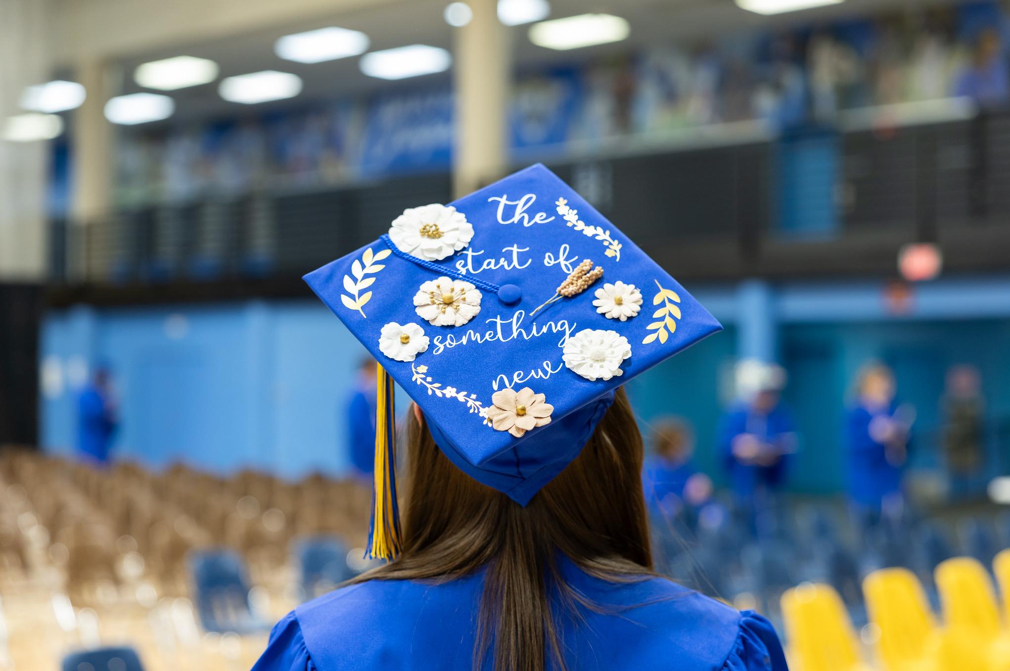 graduation cap that says the start of something new