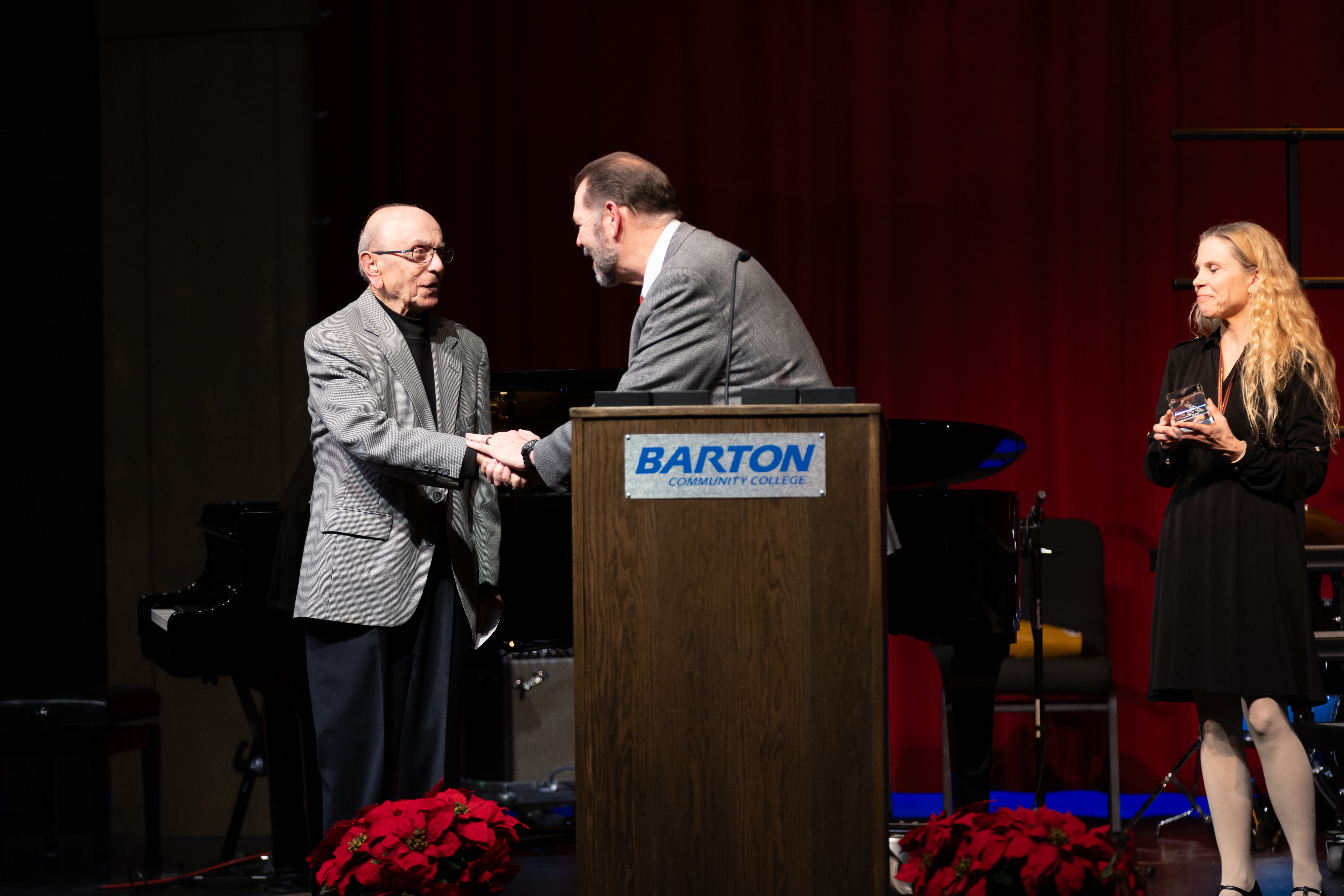 Director of Choral Activities Eric Foley presents Ken Shaheen the Hall of Fame award. Shaheen led Barton’s choral programs for more than two decades and praised the success of Barton’s choral ensembles, many of which he helped establish.