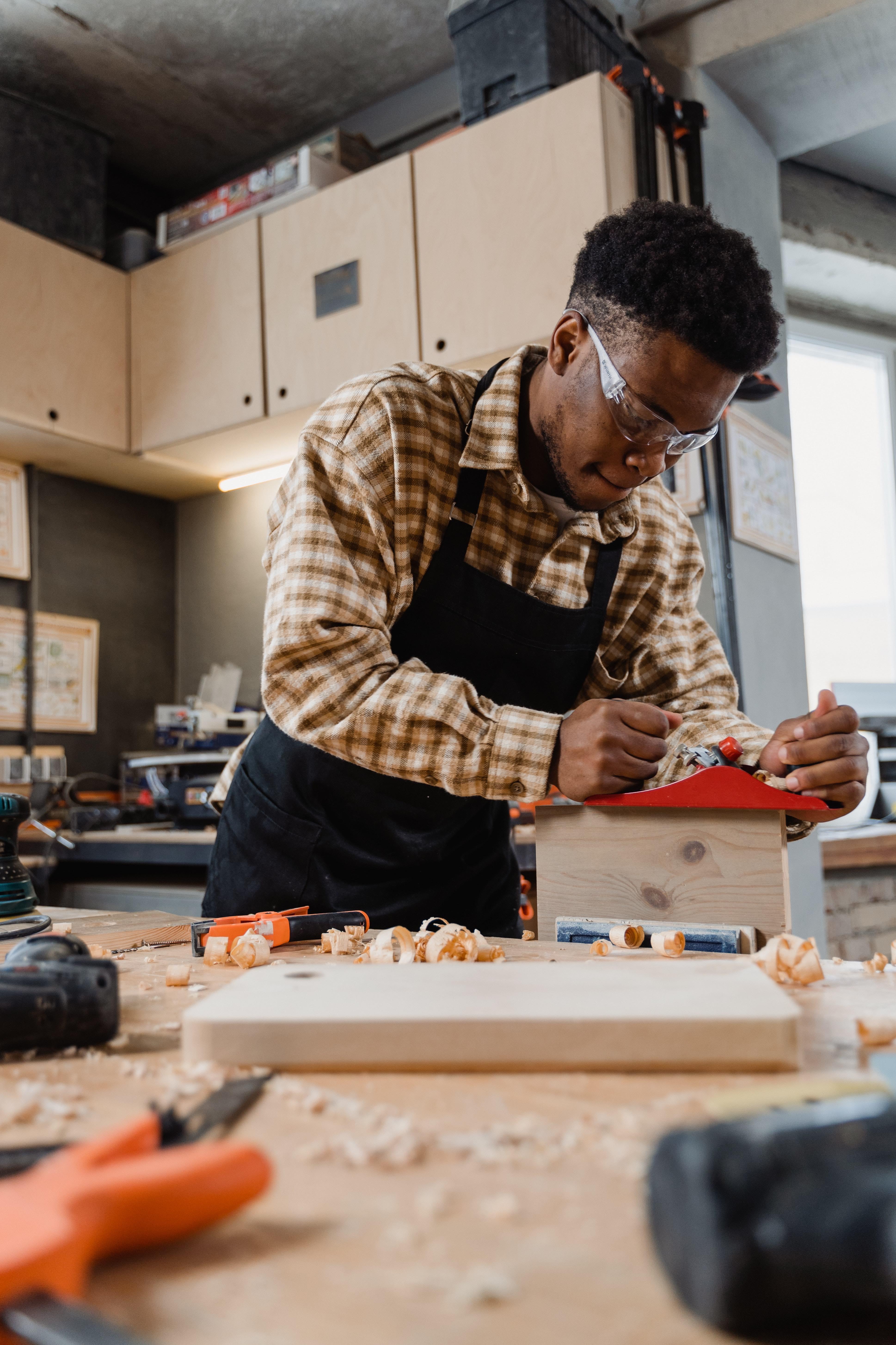 Student using carpentry tools