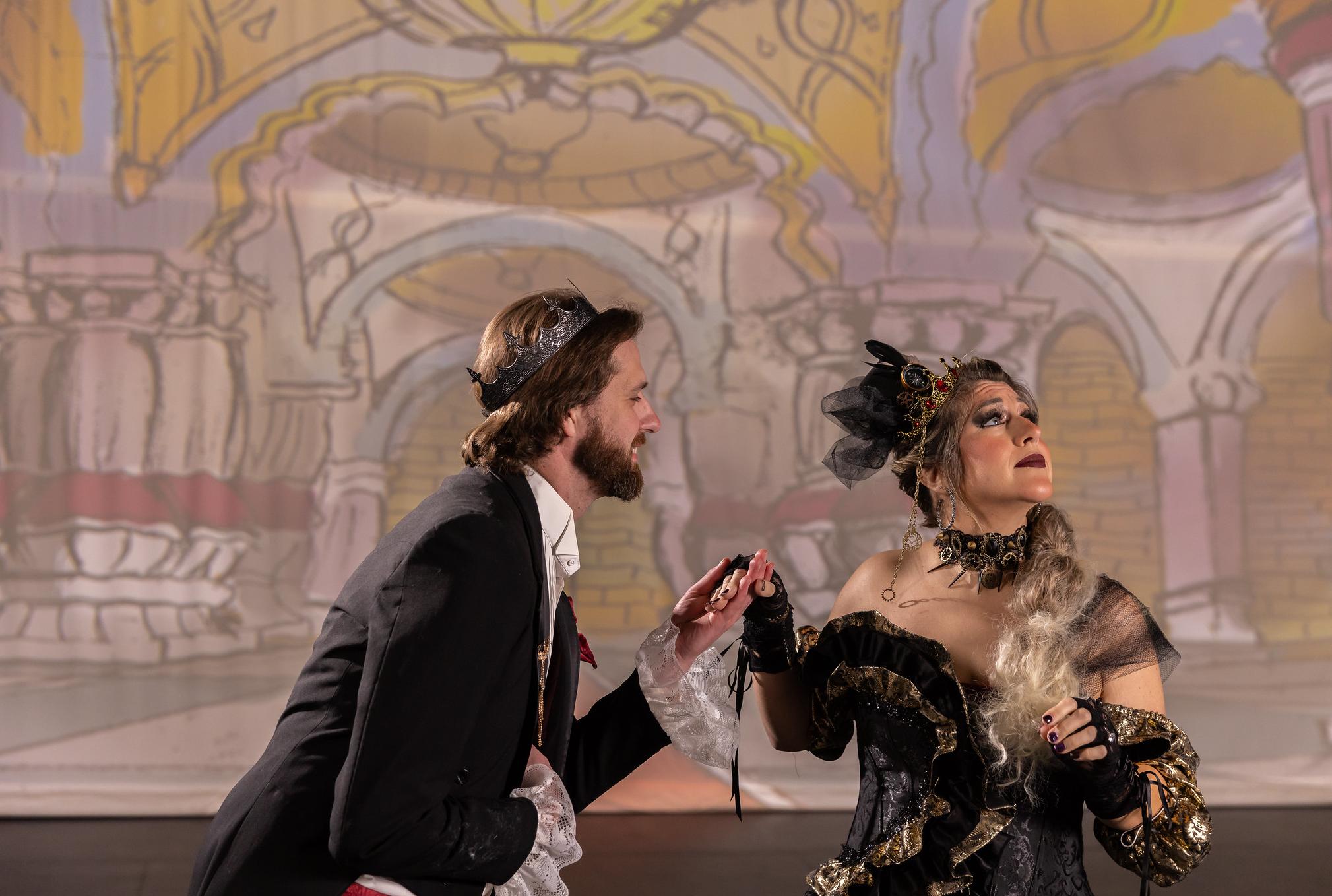 a man and woman dance in formal wear