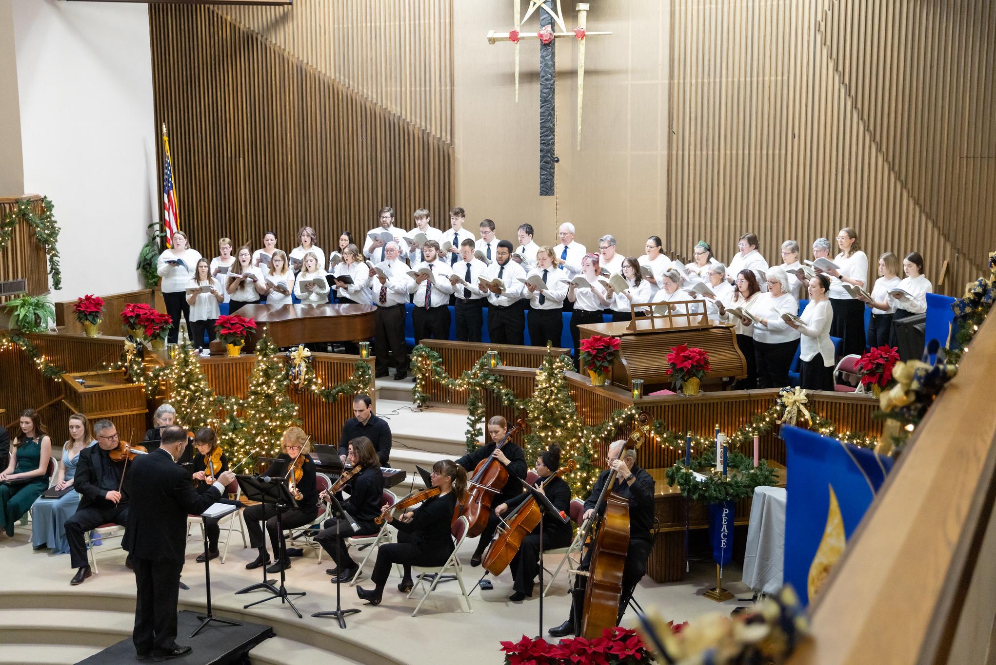 group of people singing in a church