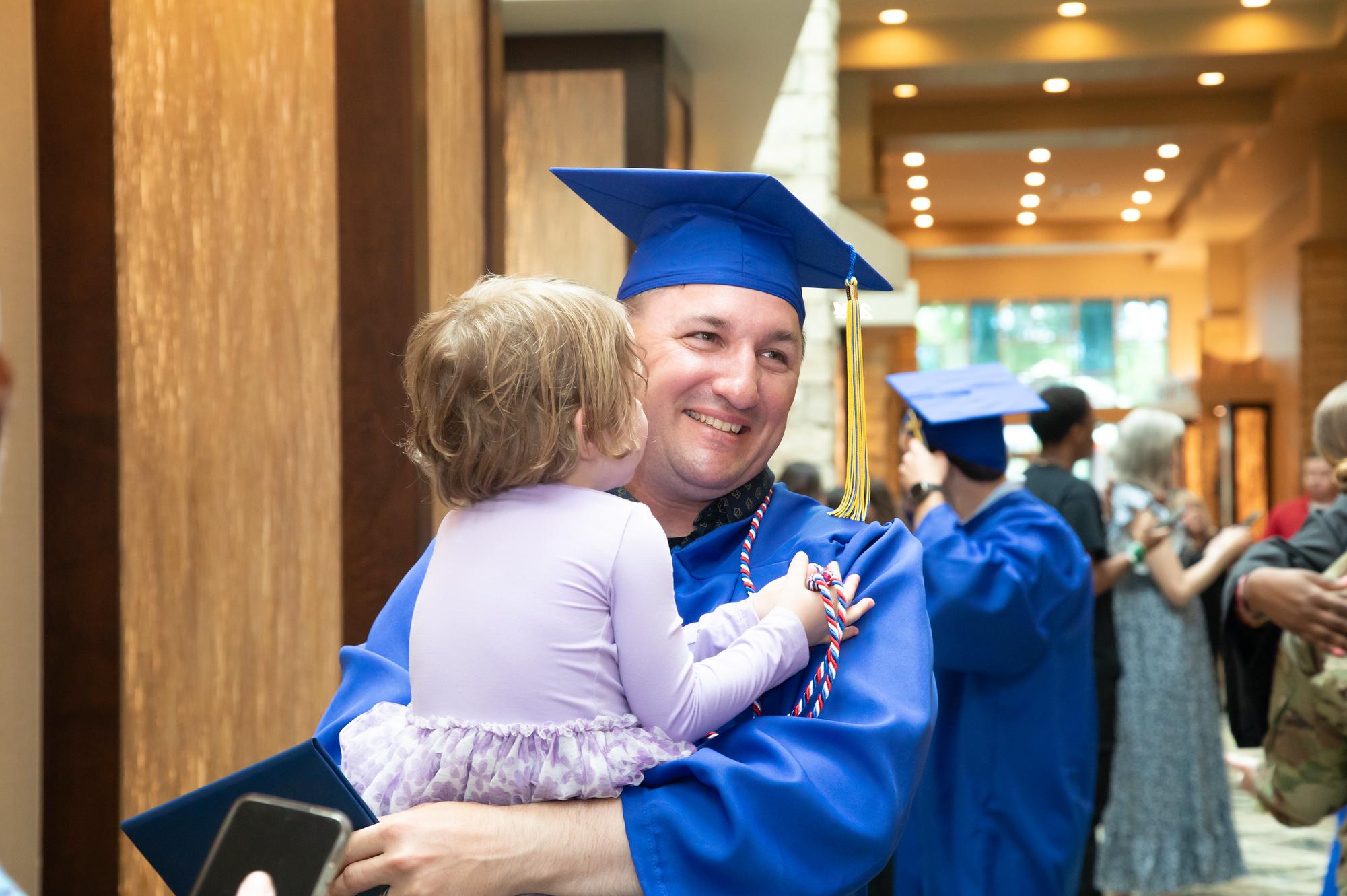 dad in graduation cap