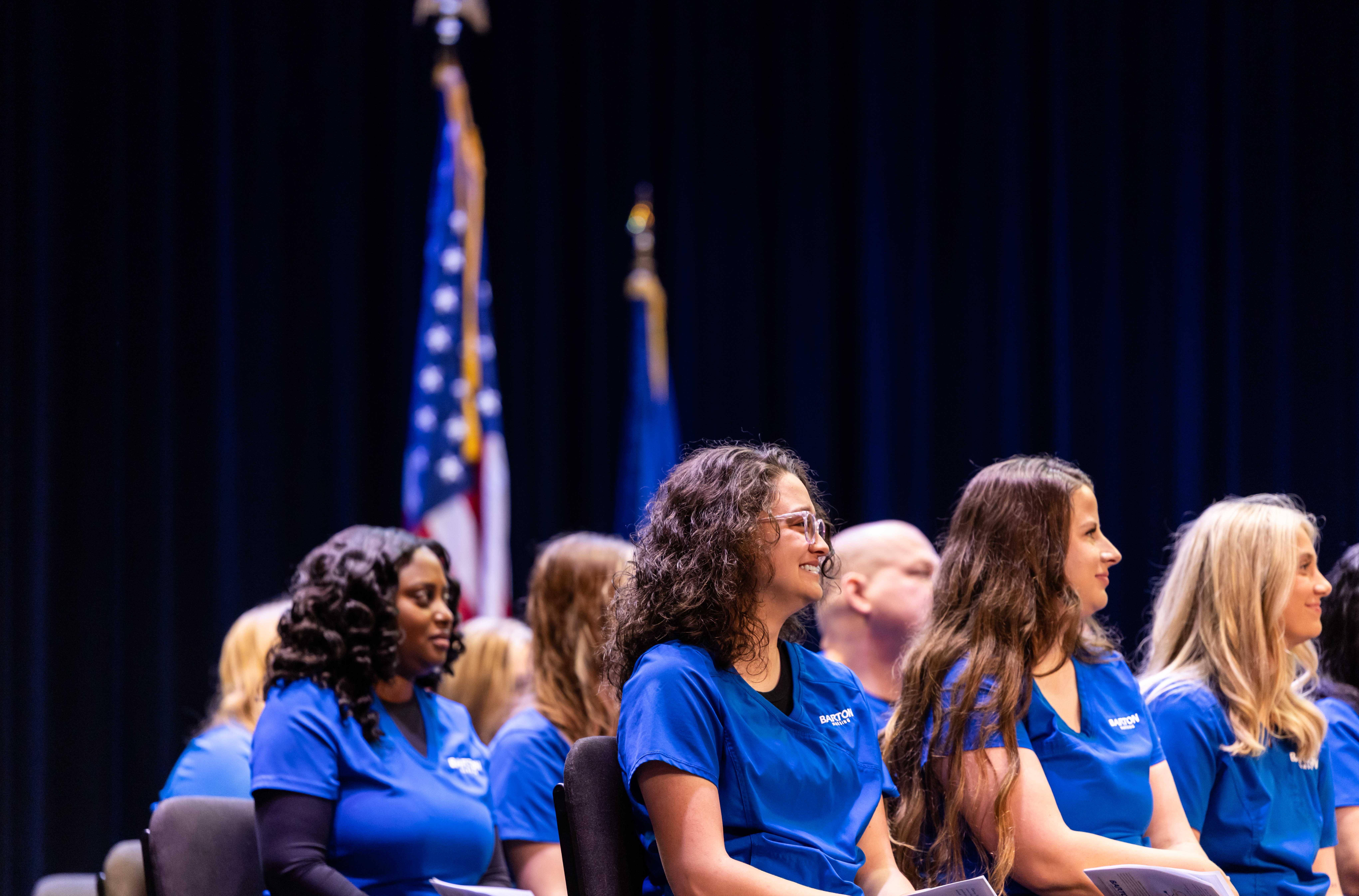 nursing students looking at a speaker