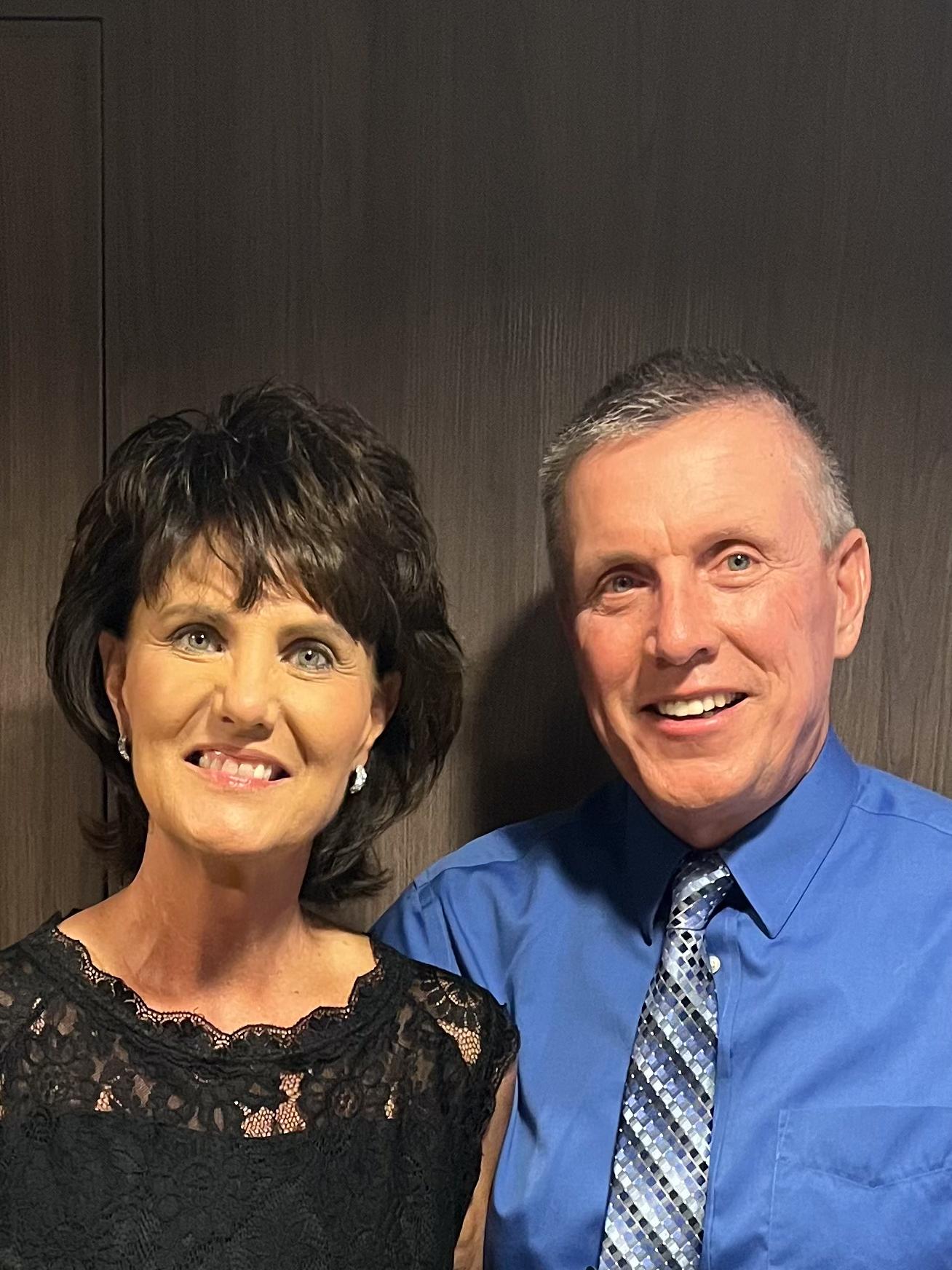 two people smiling
