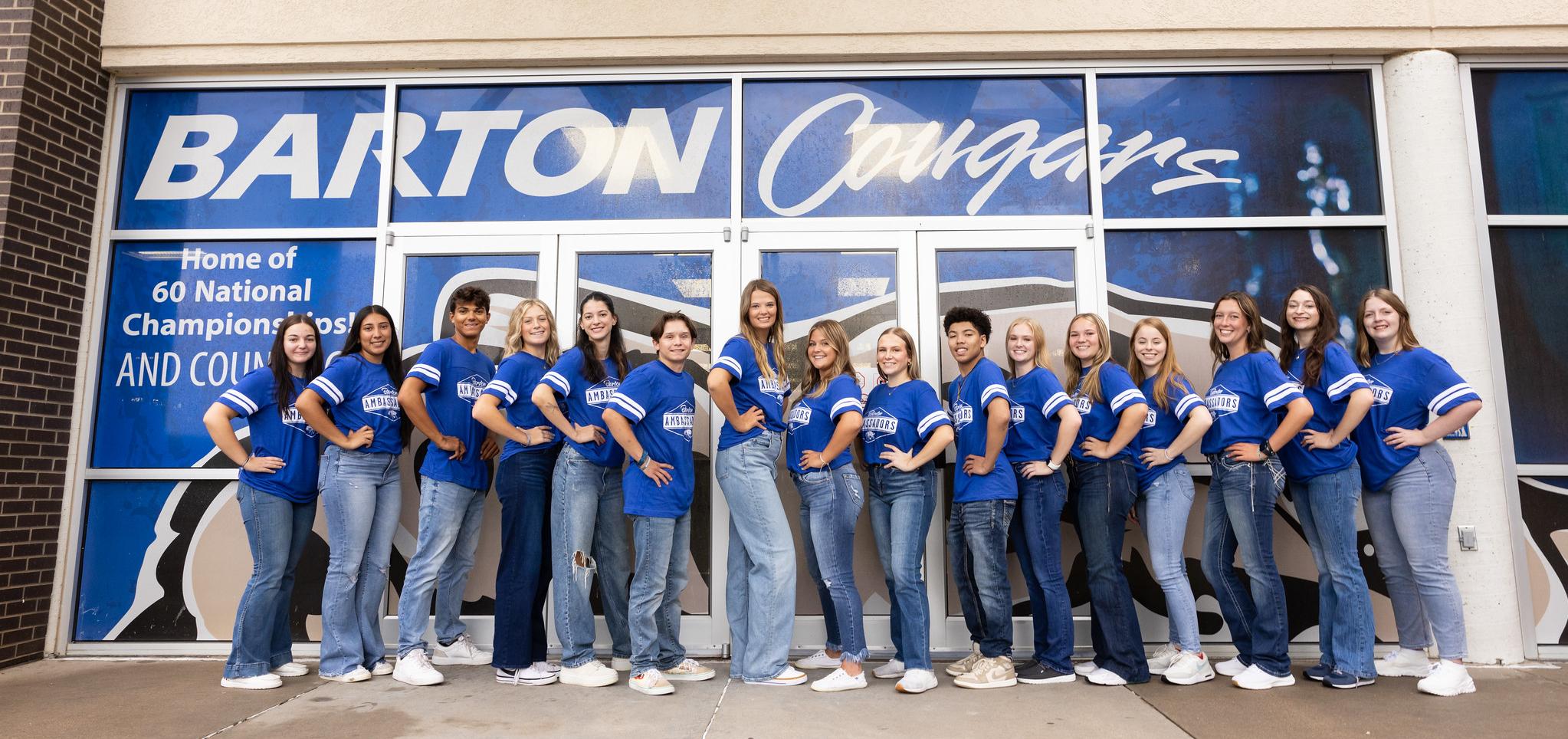 2024 student ambassadors in front of Kirkman windows