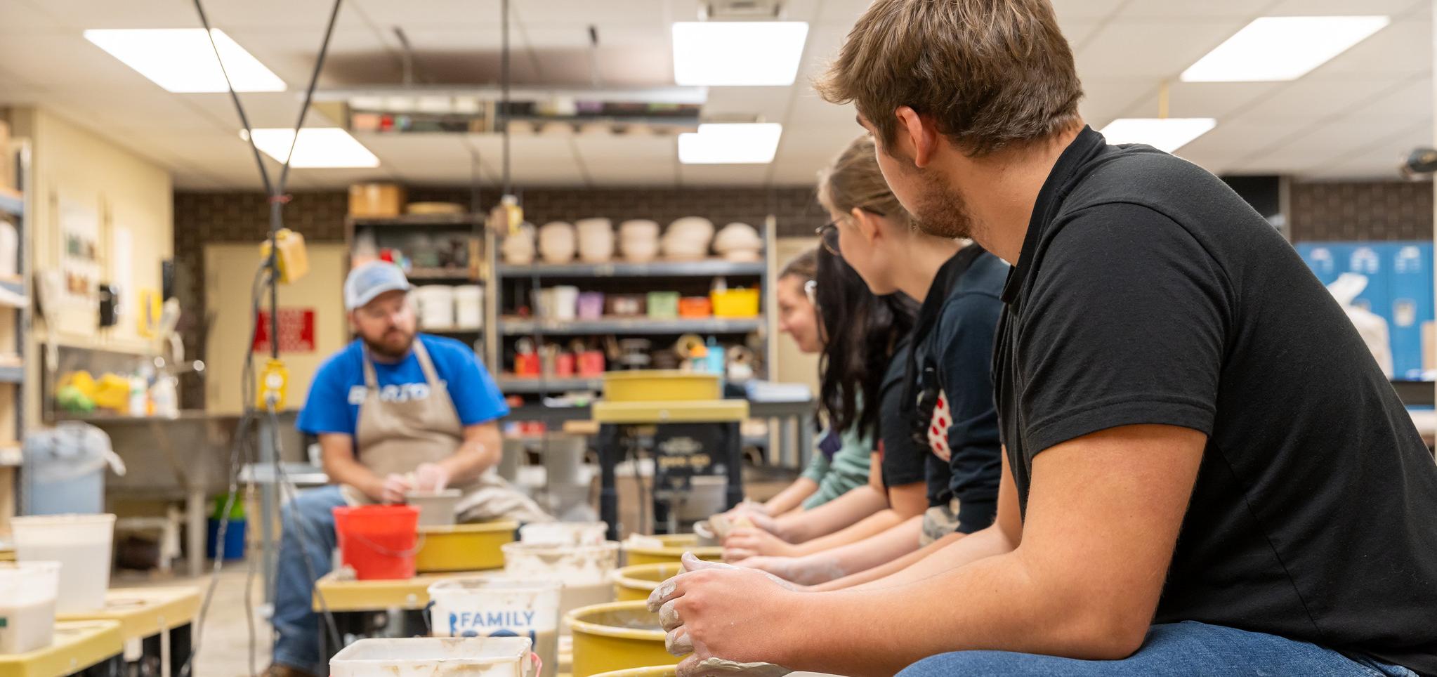 Students work on ceramics projects
