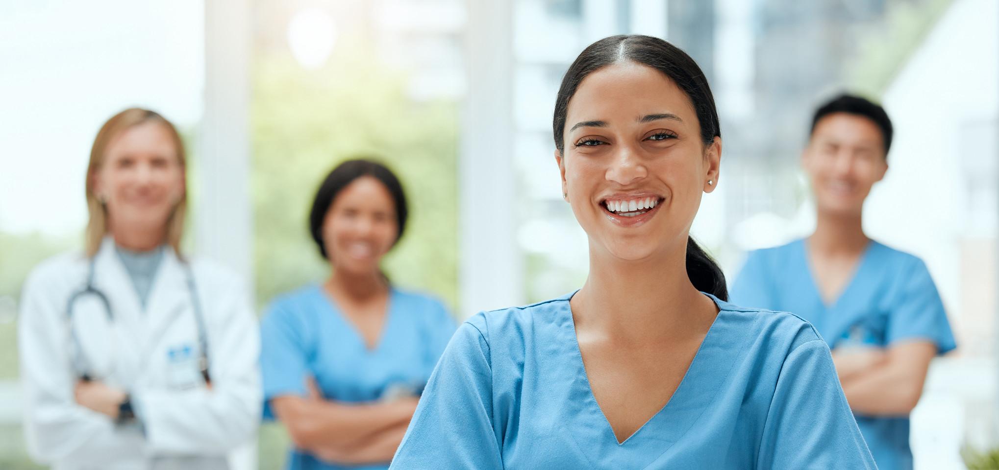 Physician Assistants stand smiling